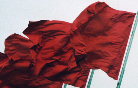 Red flags waving in the wind