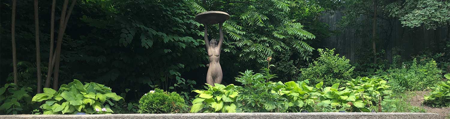 Stone Goddess in garden